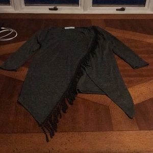 Maurice’s dark gray top with tassels